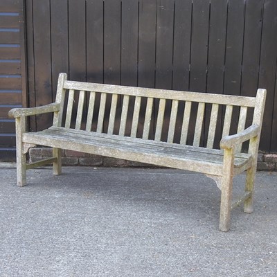 Lot 1 - A Tiger teak slatted wooden garden bench