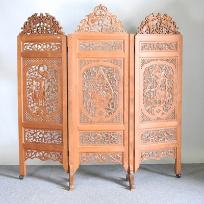 Lot 493 - An Indonesian carved hardwood three fold...