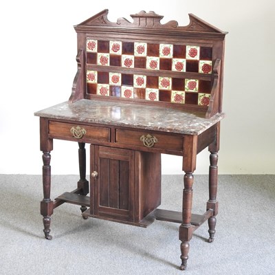 Lot 379 - An Edwardian marble top washstand. with a...