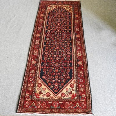 Lot 236 - A Persian Hamadan runner, with all over...