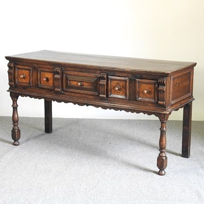 Lot 518 - An 18th century oak dresser base, early 20th...