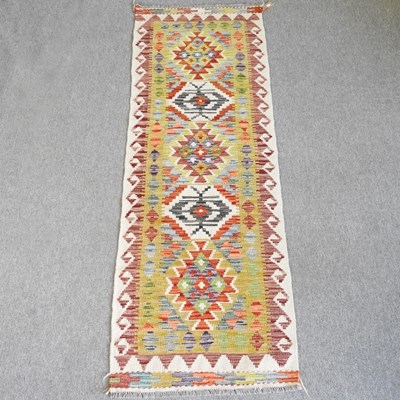 Lot 560 - A kelim runner, with all over diamond pattern,...