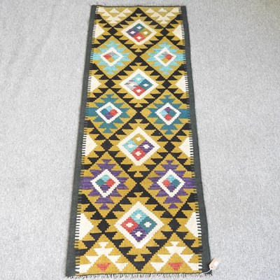 Lot 531 - A kelim runner, with all over diamond pattern,...