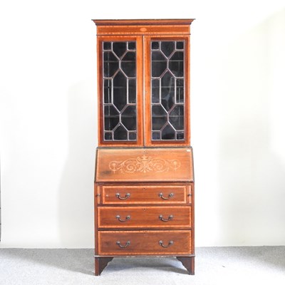 Lot 150 - An Edwardian mahogany and inlaid bureau bookcase