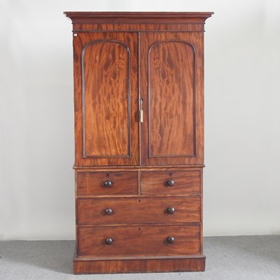 Lot 468 - A Victorian mahogany linen press, fitted with...