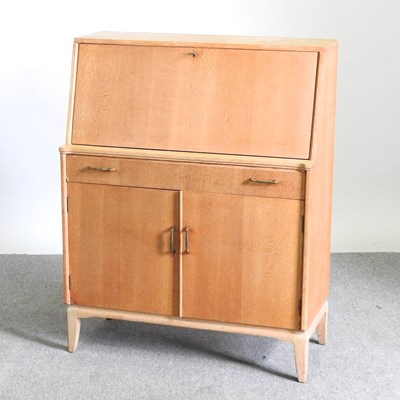 Lot 451 - A 1960's light oak bureau, with a hinged...