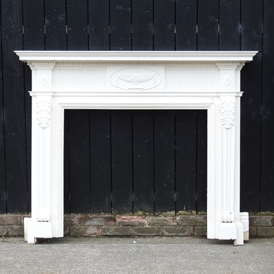 Lot 366 - A white painted wooden fire surround, with neo-...