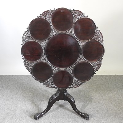 Lot 581 - A George III style carved mahogany supper...