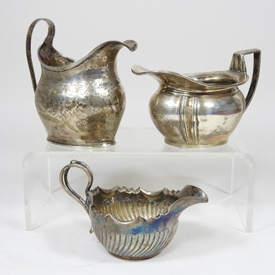 Lot 278 - A George III silver cream jug, London 1803,...