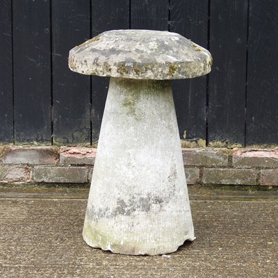 Lot 7 - A cast stone staddle stone, 72cm high