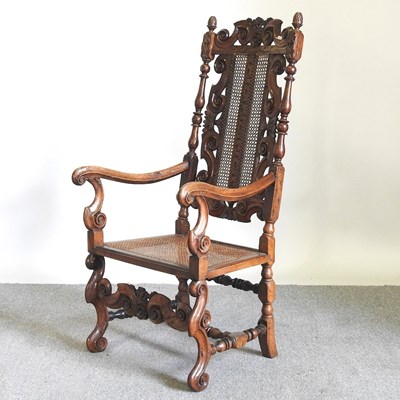 Lot 32 - A 19th century carved walnut open armchair, of...