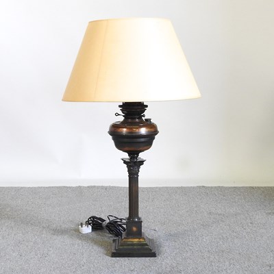 Lot 505 - An early 20th century column table lamp and...