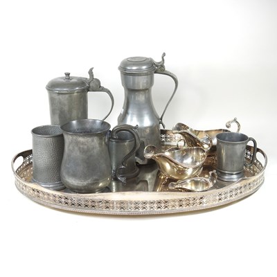 Lot 418 - A 19th century pewter tankard, with a hinged...