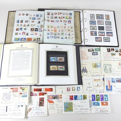 Lot 136 - A collection of stamps and albums, to include...