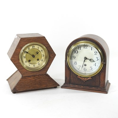 Lot 558 - An early 20th century oak cased mantel clock,...