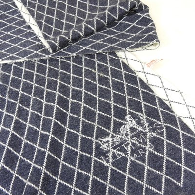 Lot 252 - A Hermes grey plaid cashmere scarf