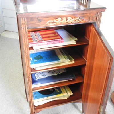 Lot 161 - An Edwardian rosewood and inlaid music cabinet,...