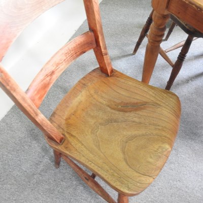 Lot 125 - A pine dining table, on turned legs, together...