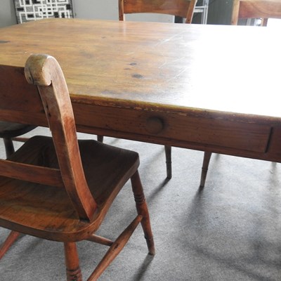 Lot 125 - A pine dining table, on turned legs, together...