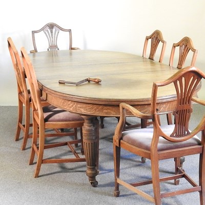 Lot 157 - A Victorian oak wind-out extending dining...