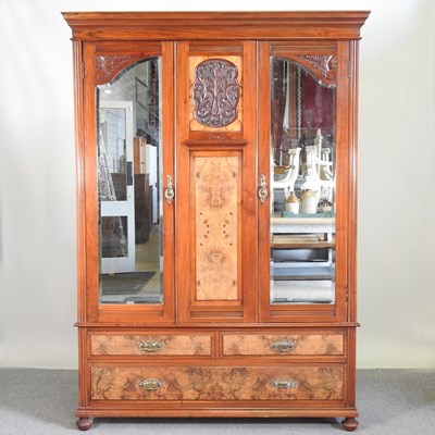 Lot 286 - An Edwardian burr walnut wardrobe, with a pair...