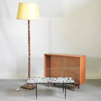 Lot 514 - A 1960's glazed bookcase, 91cm wide, together...