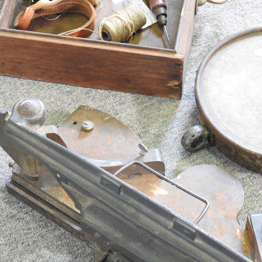 Lot 259 - A glass cutter, together with a sailmaker's