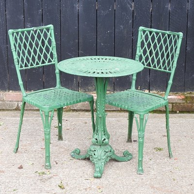 Lot 149 - A green painted cast iron garden table, 56cm...