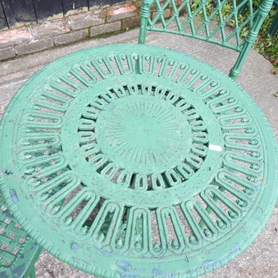 Lot 149 - A green painted cast iron garden table, 56cm...