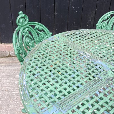 Lot 104 - A painted metal circular garden table, 98cm...