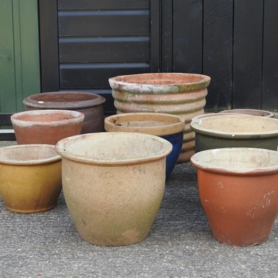 Lot 372 - A collection of glazed pottery garden pots