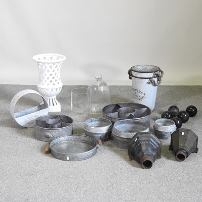 Lot 617 - A collection of metal plant pots, a glass dome,...