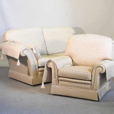 Lot 312 - A modern gold upholstered two seater sofa,...