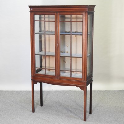 Lot 690 - An Edwardian mahogany display cabinet