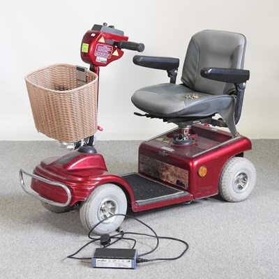 Lot 84 - A red Shoprider electric mobility scooter,...