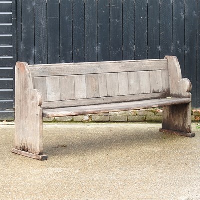 Lot 421 - A Victorian oak church pew, with a boarded back