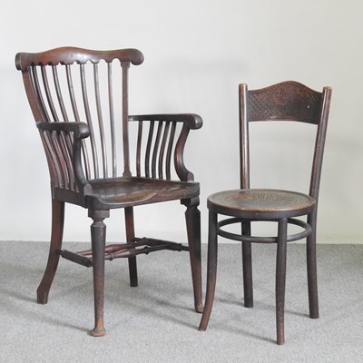 Lot 353 - An early 20th century stick back armchair,...