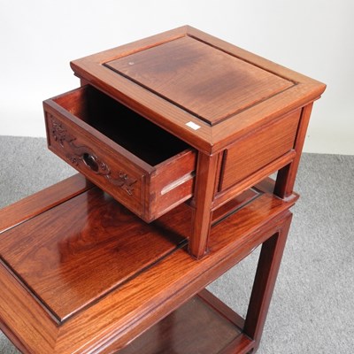 Lot 132 - A Chinese hardwood occasional table