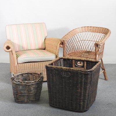 Lot 565 - A wicker armchair, together with another and...