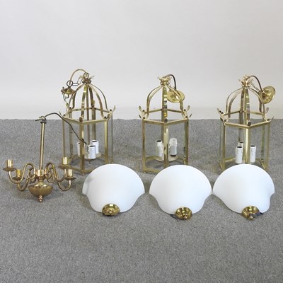 Lot 520 - Three matching brass hanging lanterns,...