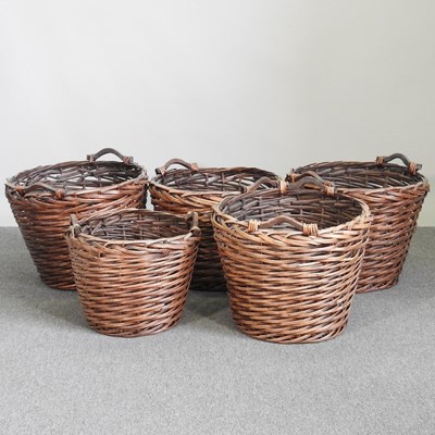 Lot 211 - A collection of five wicker baskets, 45cm high...