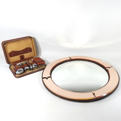 Lot 577 - An Art Deco convex circular wall mirror, with...