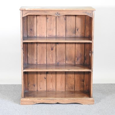 Lot 604 - A pine dwarf open bookcase, with pierced...