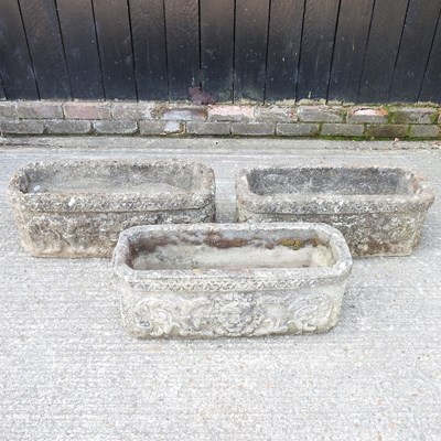 Lot 416 - A pair of cast stone garden troughs, together...