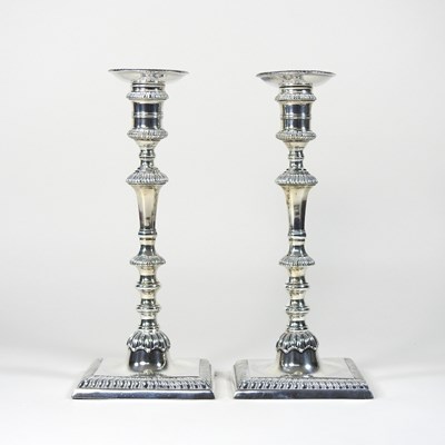 Lot 56 - A pair of George III silver table candlesticks,...