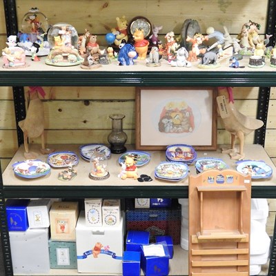 Lot 97 - A collection of Winnie the Pooh figures, to...