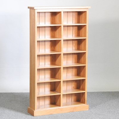 Lot 491 - A modern light oak bookcase