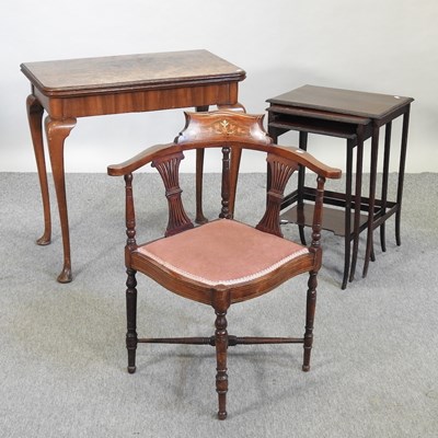 Lot 692 - A 1920's burr walnut folding card table