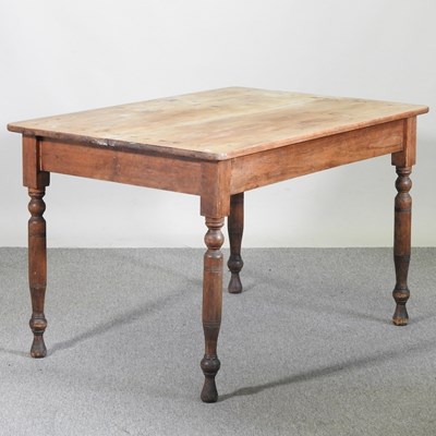 Lot 254 - An early 20th century pine dining table, of...