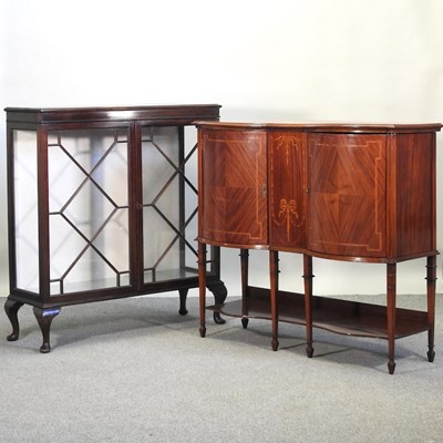 Lot 697 - An Edwardian walnut bow front sideboard